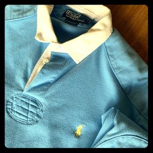 Light blue long sleeve polo collar shirt.